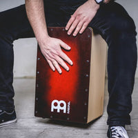 Musician Playing Meinl cajon drum at Drum Republic Drum Shop Australia.