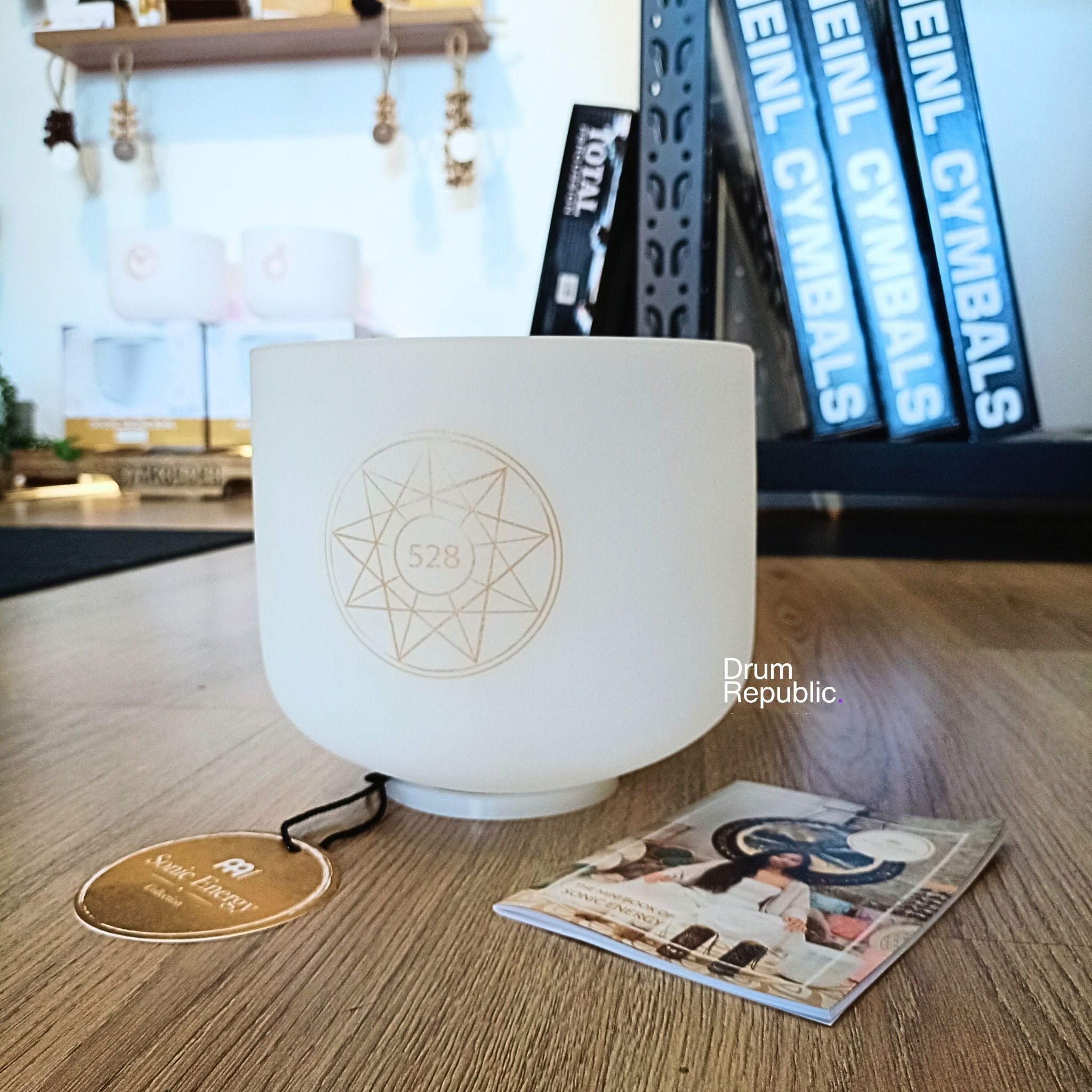 White Frosted Solfeggio Crystal Singing Bowl with 'Drum Republic' branding visible.