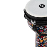 Close-up of the Meinl Jumbo Series Djembe Drum 10" Day of the Dead JD10DA showing the synthetic head, shell artwork and mechanical tuning hardware.