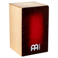 Wooden cajon drum with red interior and Meinl logo on a white background