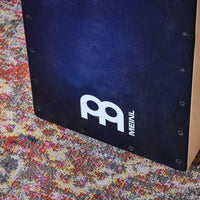 Front view of the Meinl Snarecraft Cajon SC100BLB showing the Blue Burst playing surface.