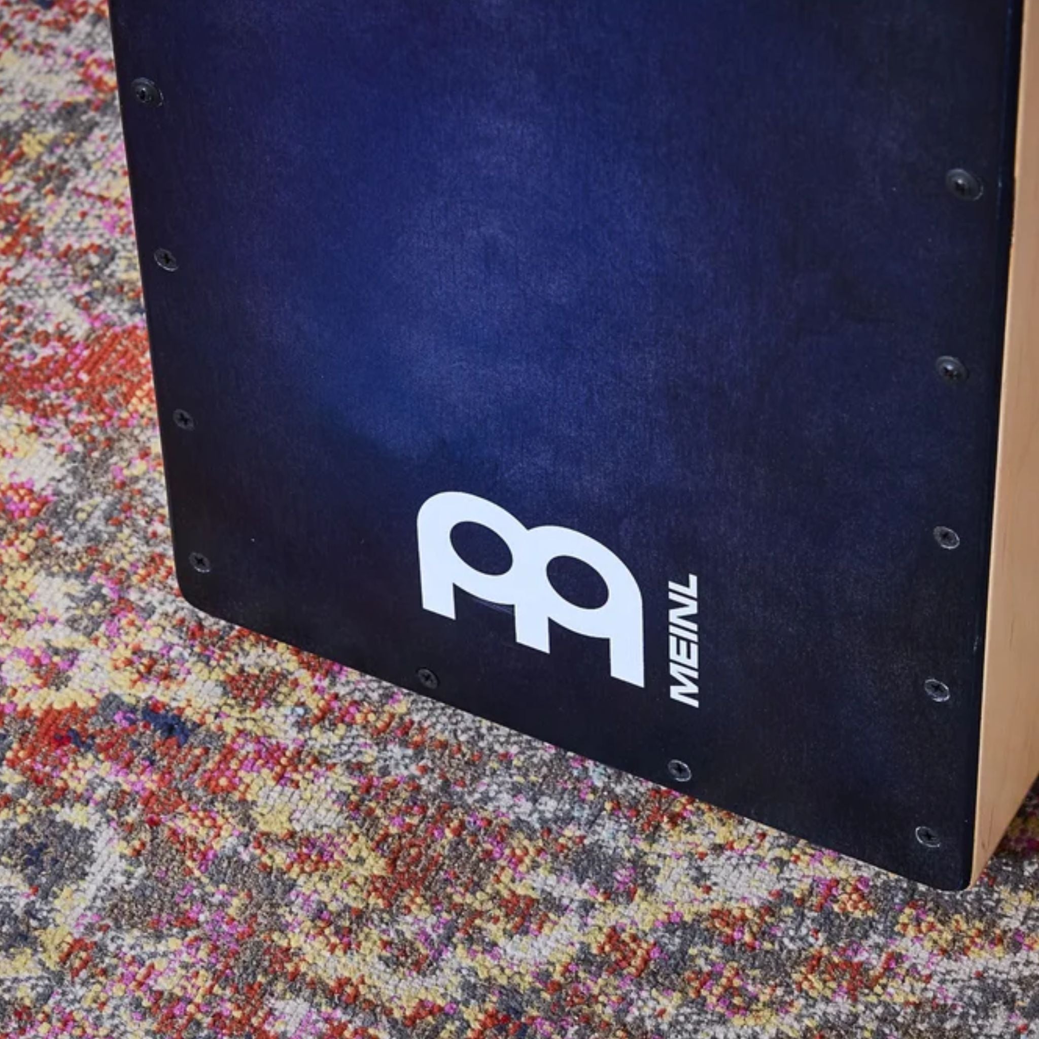 Front view of the Meinl Snarecraft Cajon SC100BLB showing the Blue Burst playing surface.