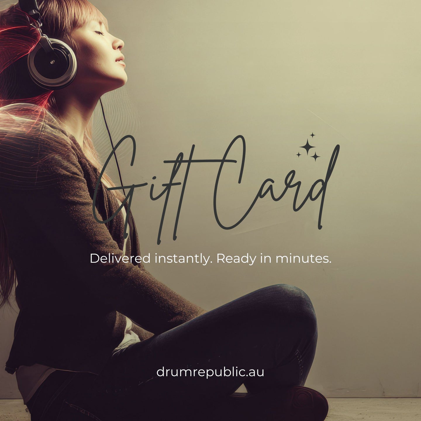 Drum Republic Gift Card with purple bow overlay on immersive sound-inspired hero image featuring woman wearing headphones and flowing frequency waves
