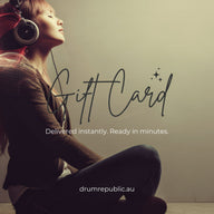 Drum Republic Gift Card with purple bow overlay on immersive sound-inspired hero image featuring woman wearing headphones and flowing frequency waves