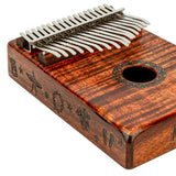 Close-up of the side of the Mahalo Kalimba Thumb Piano Handmade Beach Scene MKA17KA showing the handcrafted beach scene artwork on the solid wood body.