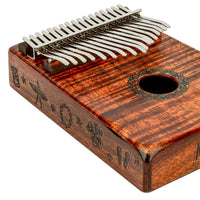 Close-up of the side of the Mahalo Kalimba Thumb Piano Handmade Beach Scene MKA17KA showing the handcrafted beach scene artwork on the solid wood body.