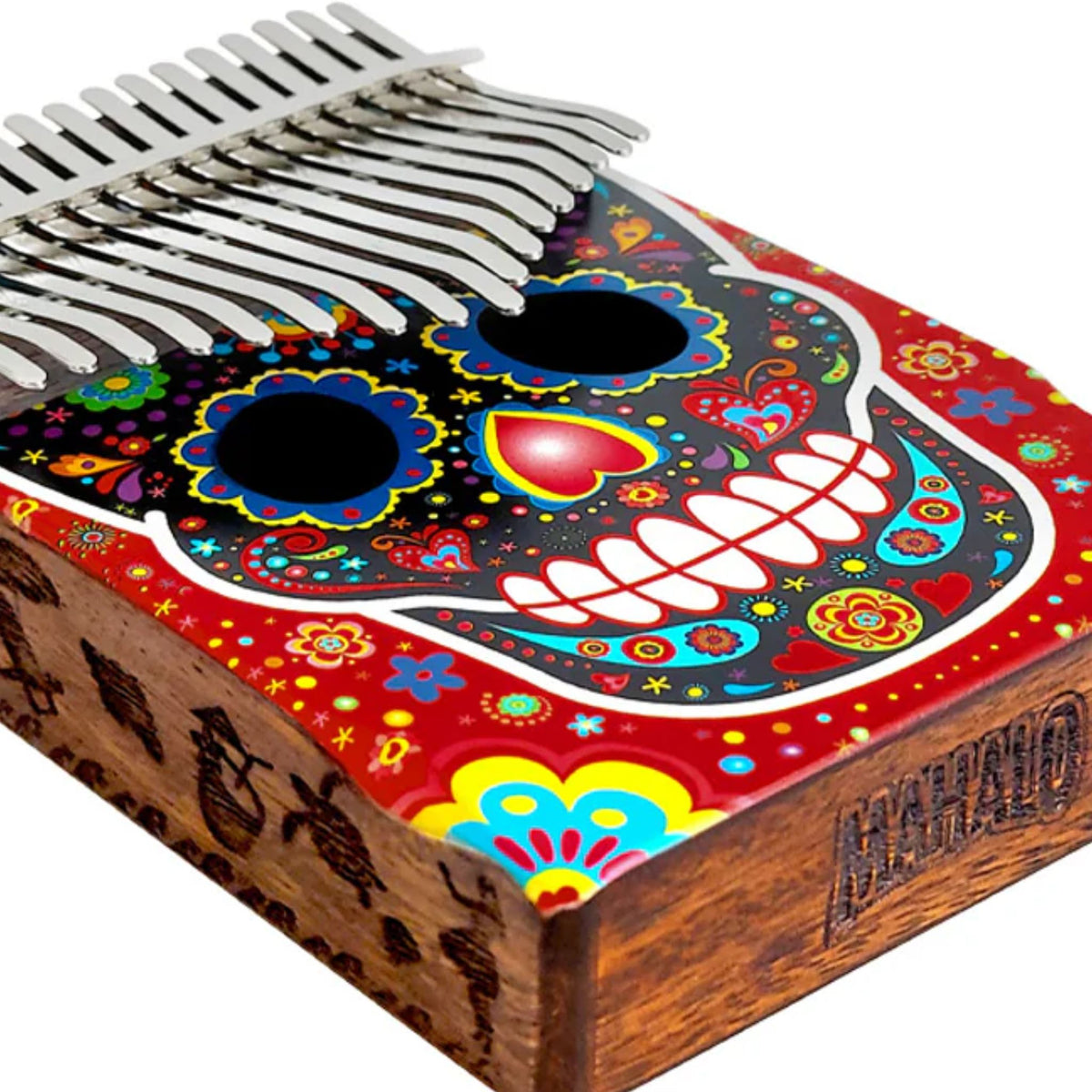 Close-up of the Mahalo Kalimba Thumb Piano Handmade Day of the Dead Skull MKA17SK showing the sound hole and handcrafted Day of the Dead Skull artwork.
