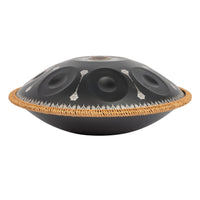 Side view of the Mano Percussion ManoPan MPC70MBK D Kurd handpan showing the black finish and silver mandala artwork.