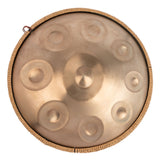 Mano Percussion ManoPan MPC69G 9-note D Kurd handpan in gold, shown from above.
