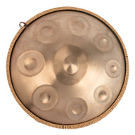 Mano Percussion ManoPan MPC69G 9-note D Kurd handpan in gold, shown from above.