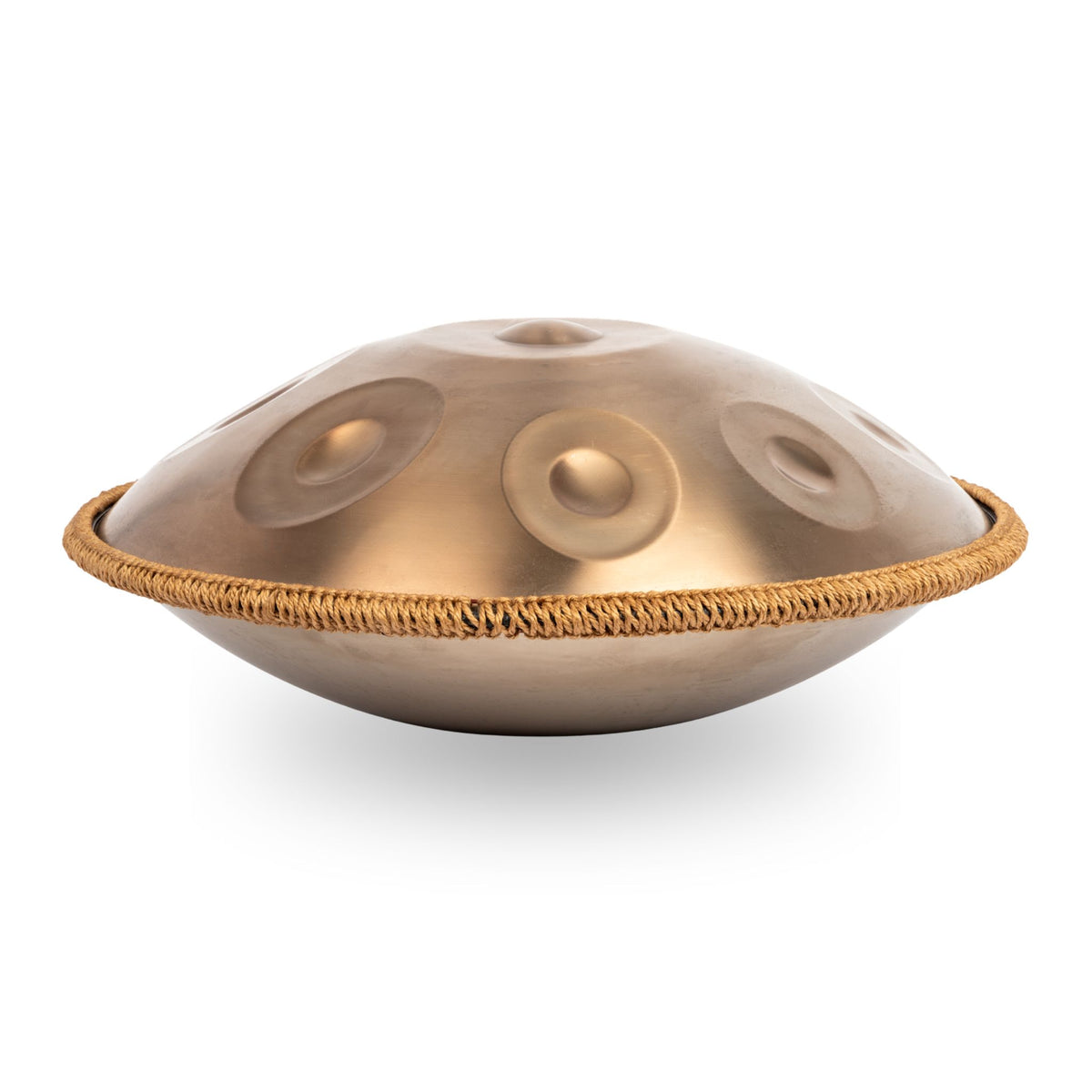 Side view of the Mano Percussion ManoPan MPC69G 9-note D Kurd handpan showing its gold stainless steel finish.