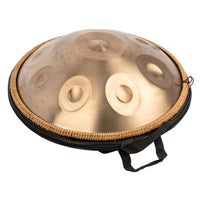 Mano Percussion ManoPan MPC69G 9-note D Kurd handpan partially visible inside its open heavy-duty carry bag.