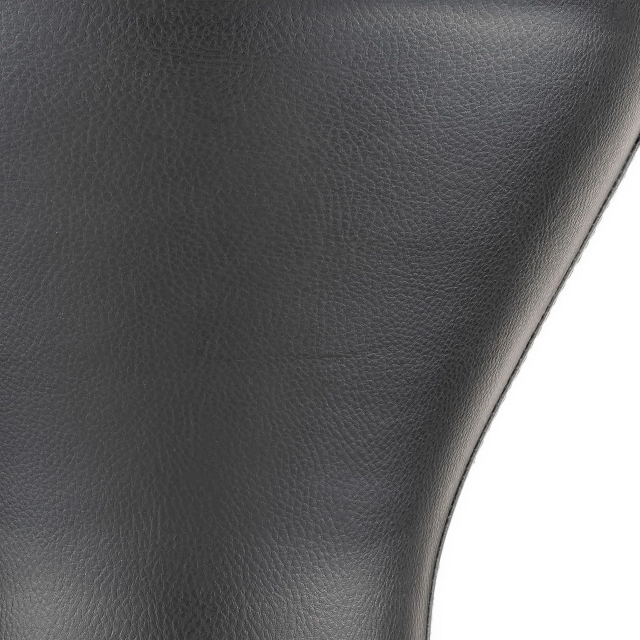close up of black leather covered shell on bass doumbek drum showing textured finish and surface detail