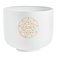 Close-up of the Meinl Sonic Energy 8-inch Solfeggio Crystal Singing Bowl 528 Hz with gold Flower of Life symbol