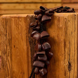 Meinl Bendo Bird Shaker 40 Seeds BI5 resting on wooden block showing natural Bendo seed nutshells and organic handcrafted design inspired by nature and percussion sounds