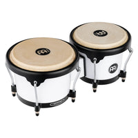 Meinl Journey Series bongo drums in white finish, angled view showing natural drumheads, black rims, and compact shell design.