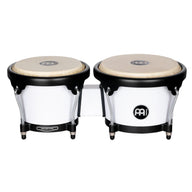 Meinl Journey Series bongo drums in white finish, compact paired bongos with natural drumheads and black hardware, front view on white background.