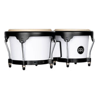 Meinl Journey Series bongo drums in white finish, side profile view highlighting compact shell depth, black rims, and mounting hardware.