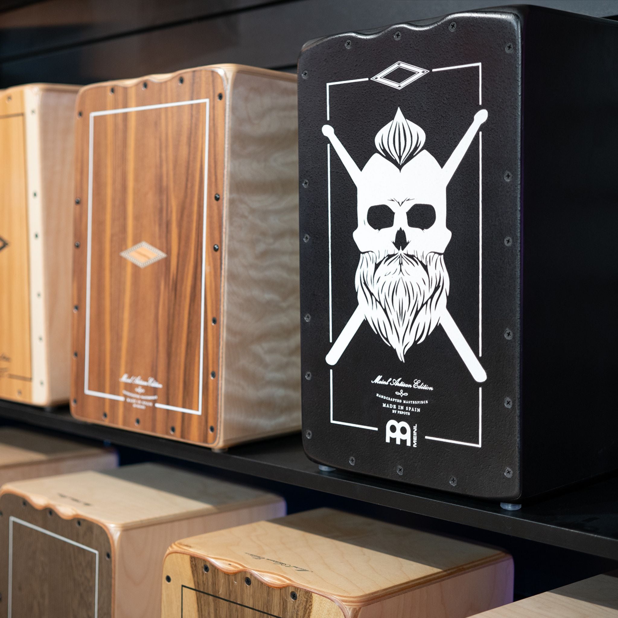 El Esteparion cajon drum on shelf at drum shop.