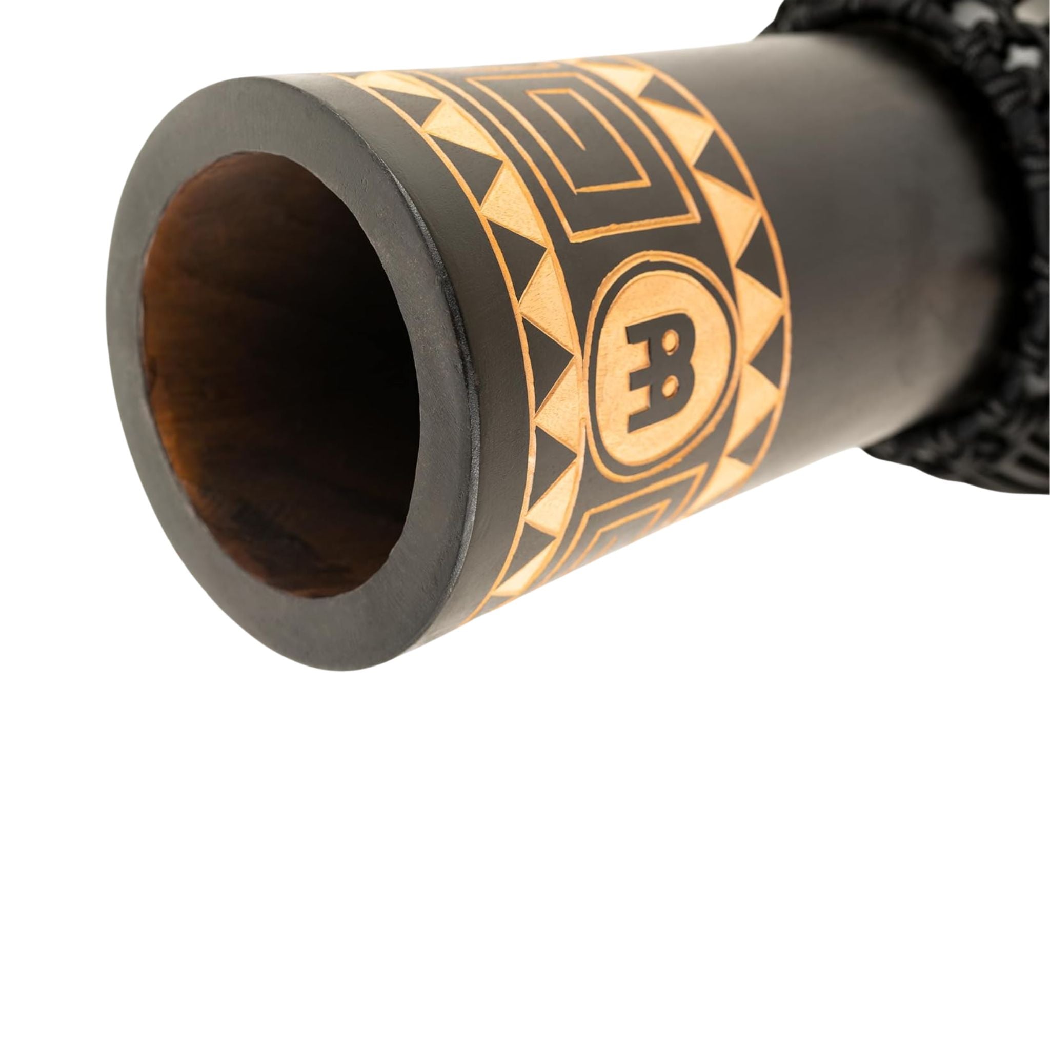 Close-up of Meinl HDJ1-M 10" Headliner Congo Series Djembe bass port and carved shell detail showing internal chamber and decorative base artwork