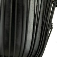 Macro detail of Meinl HDJ1-M 10" Headliner Congo Series Djembe showing rope tensioning system and textured shell surface