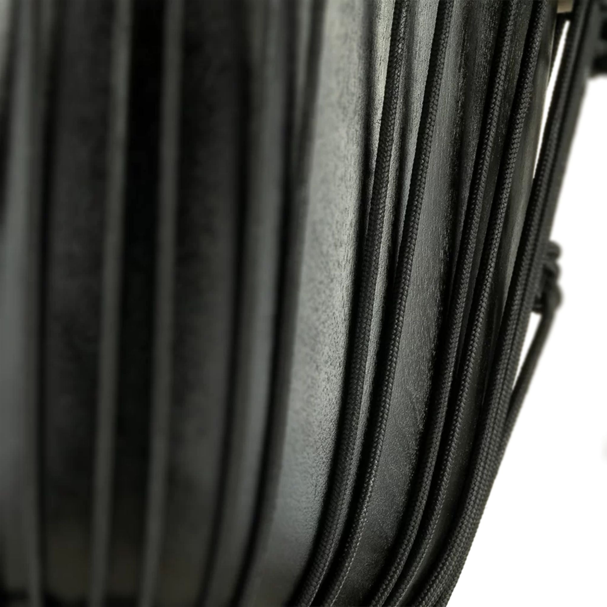 Macro detail of Meinl HDJ1-M 10" Headliner Congo Series Djembe showing rope tensioning system and textured shell surface