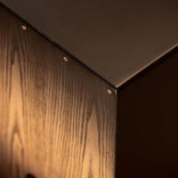 Close-up of the Meinl Headliner Series Snare Cajon MCAJ100BK-CBF showing precision craftsmanship at the front, side and top corner junction