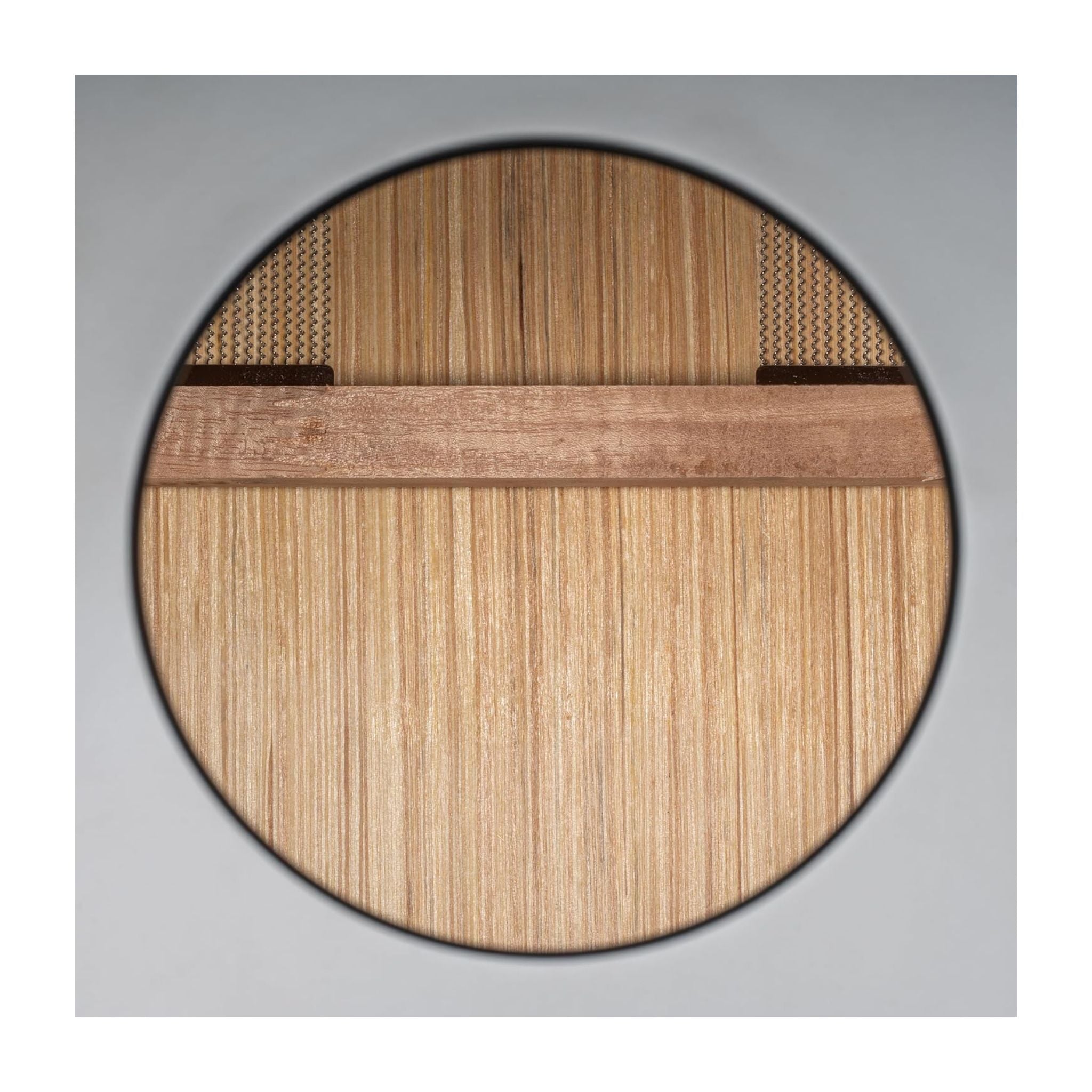 Close-up inside the Meinl Headliner Series Snare Cajon MCAJ100BK-CBF revealing internal snare wires and resonant construction