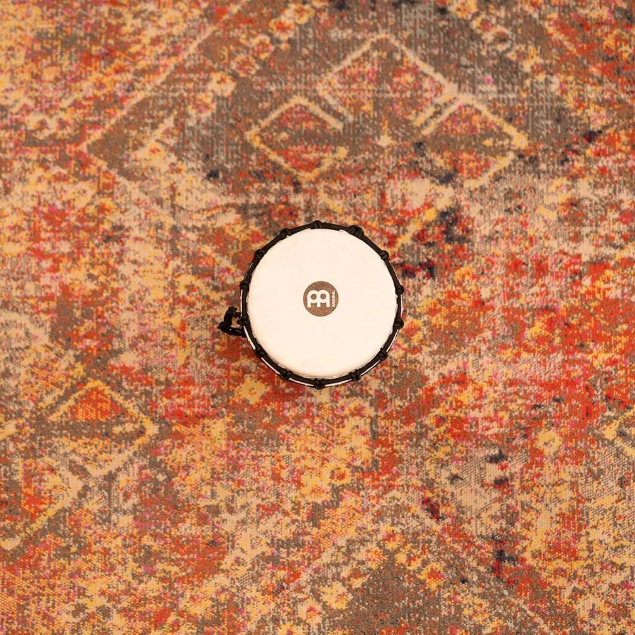 Overhead view of Meinl Junior Djembe Drum 7 inch Green JRD-G showing drum head and compact size