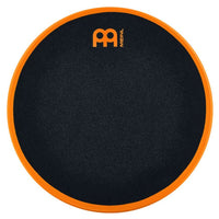 Meinl Marshmallow Practice Pad 12 inch in orange (MMP12OR), top-down view of textured black foam playing surface with orange rim on a white background.
