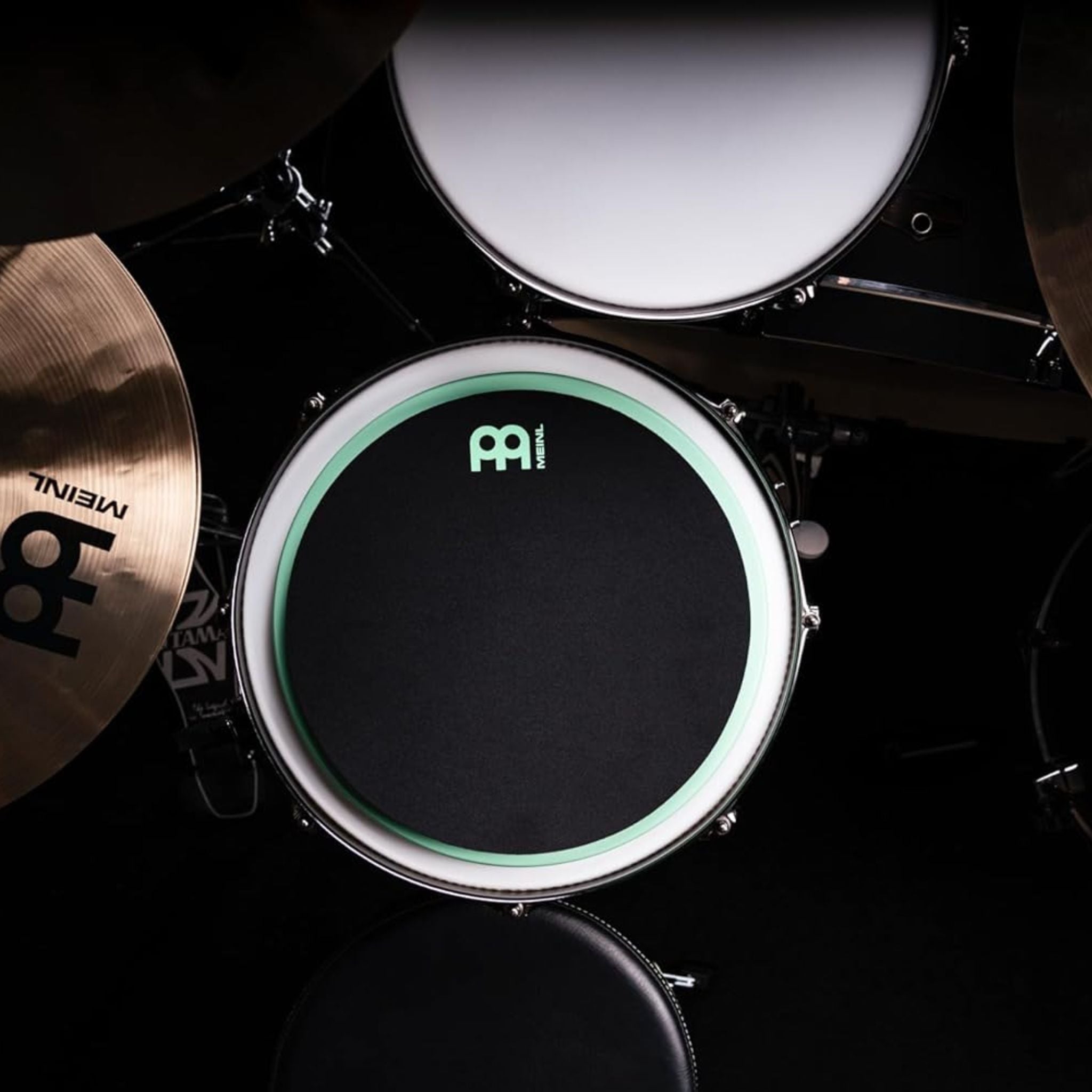 Meinl Marshmallow Practice Pad 12 inch Sea Foam MMP12SF placed on snare drum within drum kit setup for quiet practice and stick control exercises