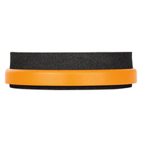 side view of Meinl Marshmallow Practice Pad 6 inch Orange MMP6OR showing thick marshmallow foam surface and durable composite base on white background