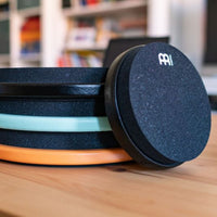 Meinl Marshmallow Practice Pad 6" Black MMP6BK displayed alongside Marshmallow Practice Pads in assorted sizes and colours.