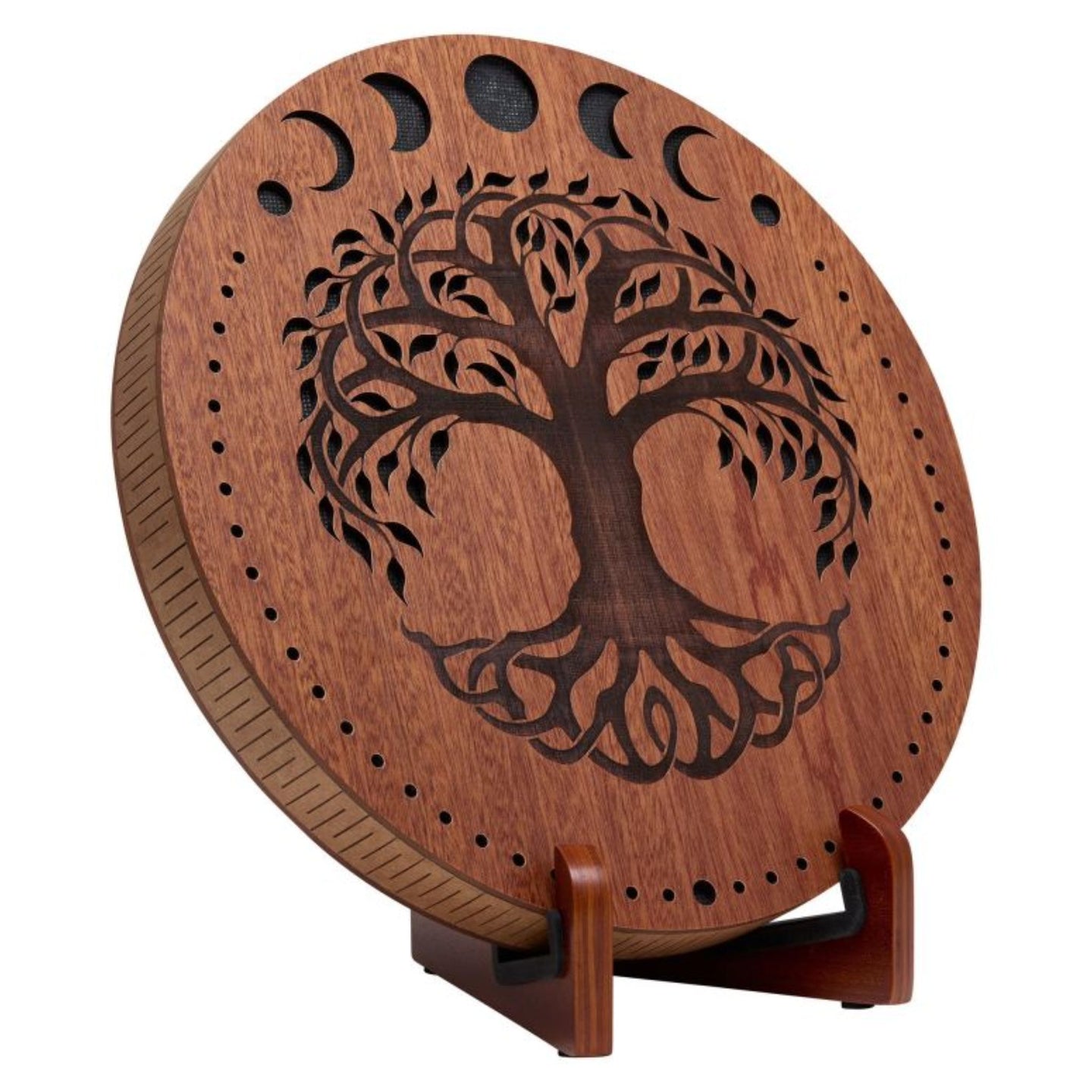 12 inch rain disk with Moon Phases and Tree of Life carving on wooden stand against white background showing natural carved surface detail