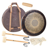 Meinl Sonic Energy 24 inch Flower of Life Soundscape Gong 64Hz GFOL24 with included travel bag, gong handle, gong cord, protective gloves, and two gong mallets displayed together on white background.