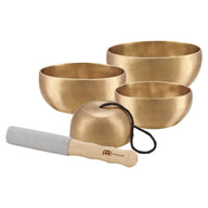 Meinl Sonic Energy 4-Piece Universal Series Singing Bowl Set SB-U-1750 on white background featuring four handcrafted bronze singing bowls in 250g, 400g, 500g, and 600g sizes with suede mallet, felt rings, and protective covers for meditation, sound therapy, and relaxation.