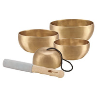 Meinl Sonic Energy 4-Piece Universal Series Singing Bowl Set SB-U-1750 on white background featuring four handcrafted bronze singing bowls in 250g, 400g, 500g, and 600g sizes with suede mallet, felt rings, and protective covers for meditation, sound therapy, and relaxation.