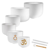 Meinl Sonic Energy 6-Piece Om Crystal Singing Bowl Set CSBSETOM6 on white background featuring six white frosted quartz crystal singing bowls with silicone rings, crystal silicone rod, and crystal singing bowl mallet for meditation, sound therapy, and immersive sound exploration.