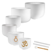 Meinl Sonic Energy 6-Piece Om Crystal Singing Bowl Set CSBSETOM6 on white background featuring six white frosted quartz crystal singing bowls with silicone rings, crystal silicone rod, and crystal singing bowl mallet for meditation, sound therapy, and immersive sound exploration.