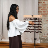 Woman playing Meinl Sonic Energy Bendo Chimes SBCH during a sound healing session for meditation and relaxation.