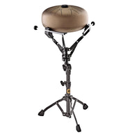 Meinl Sonic Energy handpan stand supporting a gold steel tongue drum, designed for balance, resonance, and professional sound healing applications.