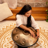Musician performing on the Meinl Sonic Energy Handpan, demonstrating its rich sustain and warm, resonant tone.