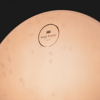 Close-up of Meinl Sonic Energy Wave Drum 16-inch showing Sonic Energy logo on natural drum head, highlighting craftsmanship and sound quality.