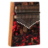 Meinl Sound Hole Designer Kalimba Lava KA17LV on white background featuring 17-note C Major tuning, acacia wood body, chrome-plated steel tines, and lava-inspired artwork for melodic sound exploration and relaxation.