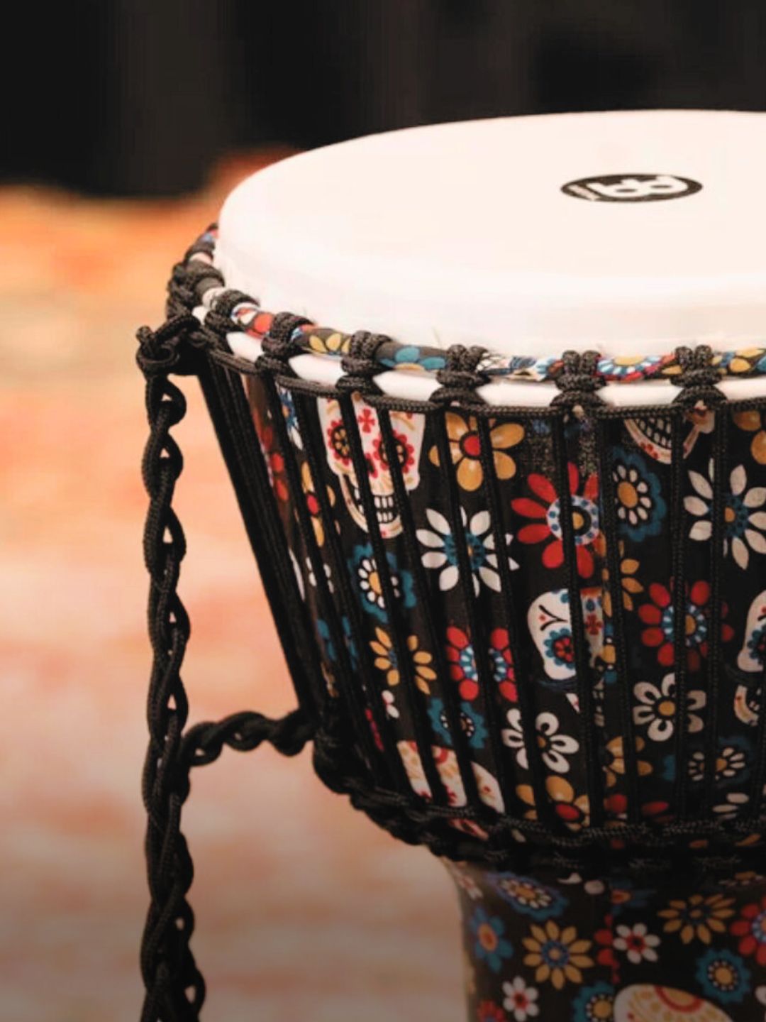 Handcrafted djembe drum representing professional percussion instruments played for rhythm, expression, and cultural sound.