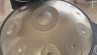 Mano Percussion ManoPan gold handpan being played, demonstrating its warm resonant tone and sustained sound.