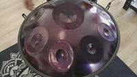 Sound demonstration of the Mano Percussion ManoPan MPC55P 10-note D Kurd handpan in purple, showcasing its warm resonance and sustained tones.