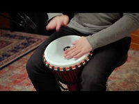 Video demonstrating the Meinl Travel Series Djembe Drum 10" Pharaoh's Script PADJ1-M-F, showcasing its deep bass tones, sharp slap response, and lightweight synthetic construction.