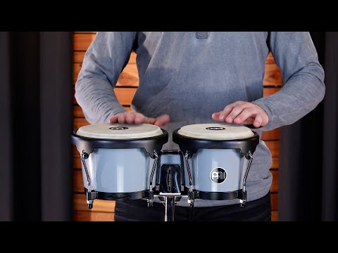 Demonstration and review of the Meinl Journey Series Bongo Drums in Ultimate Gray (HB50UG). Close-up play shots, sound examples, and performance in a studio setting showcasing tone, feel, and build quality.