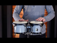 Demonstration and review of the Meinl Journey Series Bongo Drums in Ultimate Gray (HB50UG). Close-up play shots, sound examples, and performance in a studio setting showcasing tone, feel, and build quality.